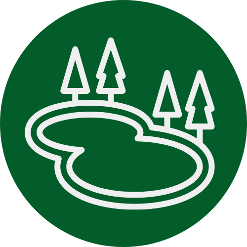 A green circle with trees in the middle of it.